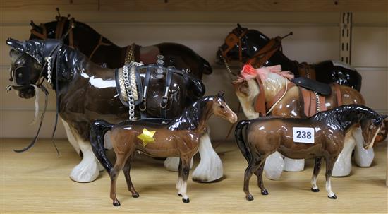 Two Beswick horses and four shire horse groups